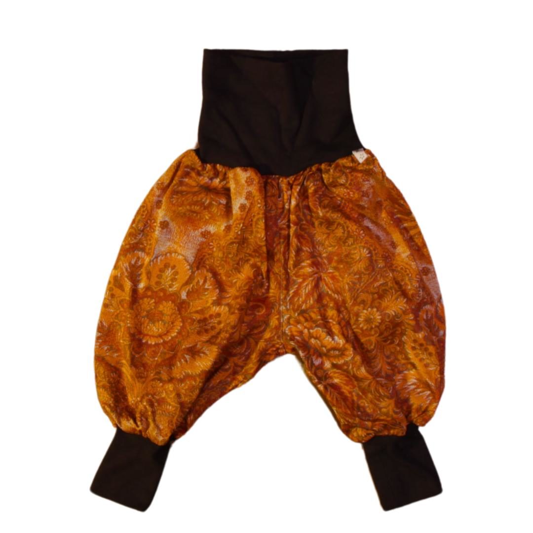 anna * pollack, Minipirat, oranges Parsley-Muster mit braunen Bündchen